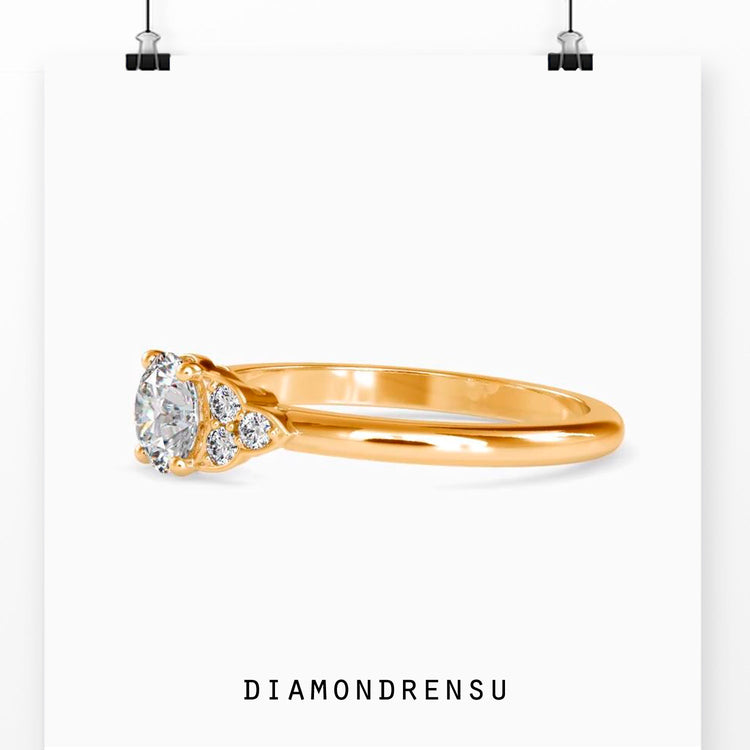 Diamondrensu UK engagement ring with round cut lab diamonds.