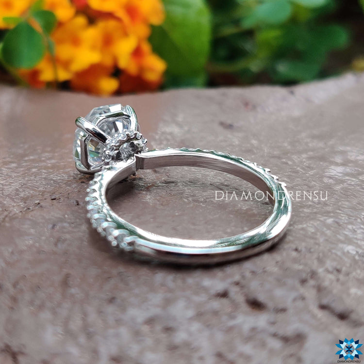 Round cut pave band with octagon center moissanite.