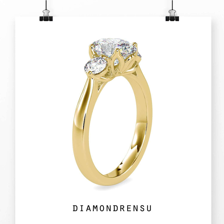 Rose gold ring with oval and round diamonds.