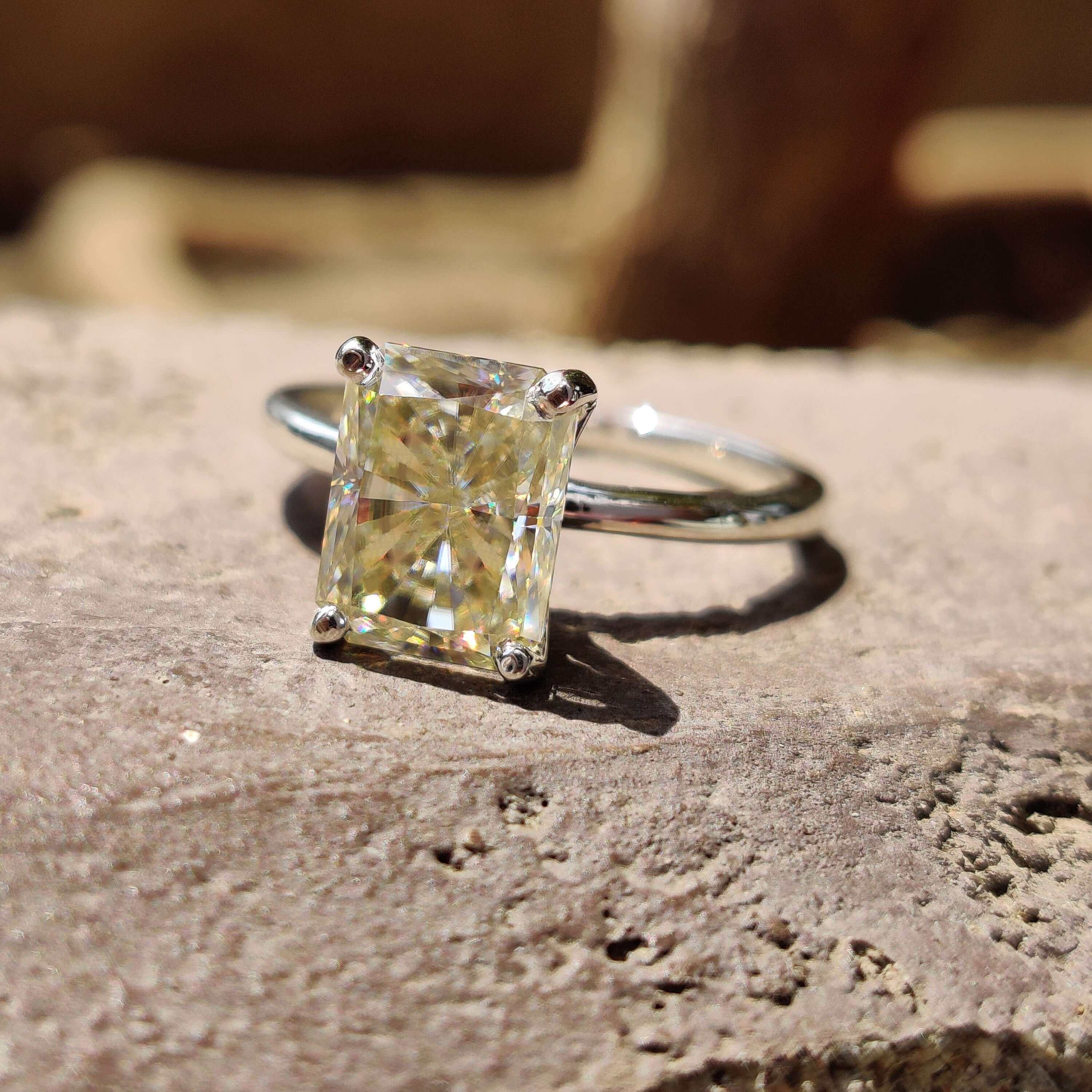 Diamondrensu UK ring featuring handmade radiant moissanite in solitaire style.