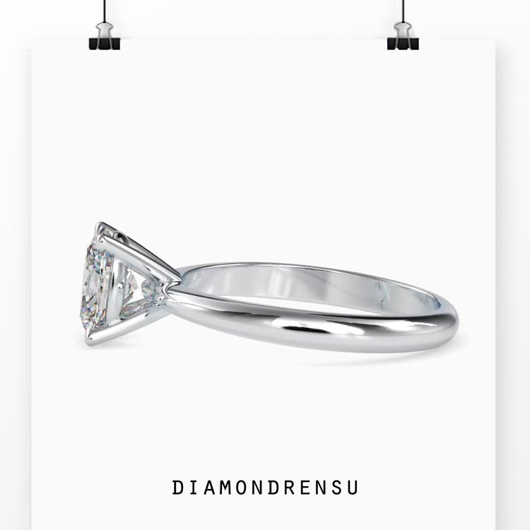 Diamondrensu UK ring with oval solitaire setting.