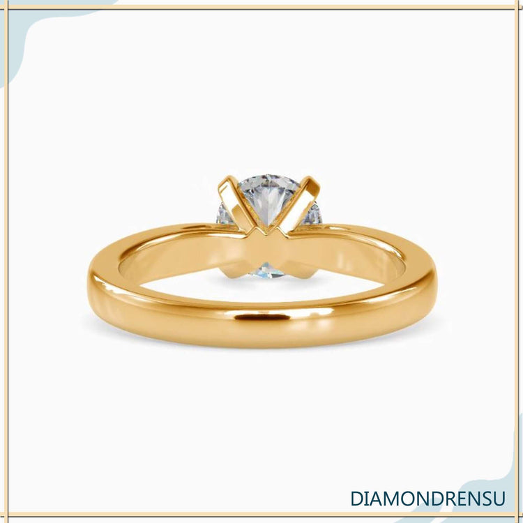 Lab grown diamond ring in simple round brilliant design.