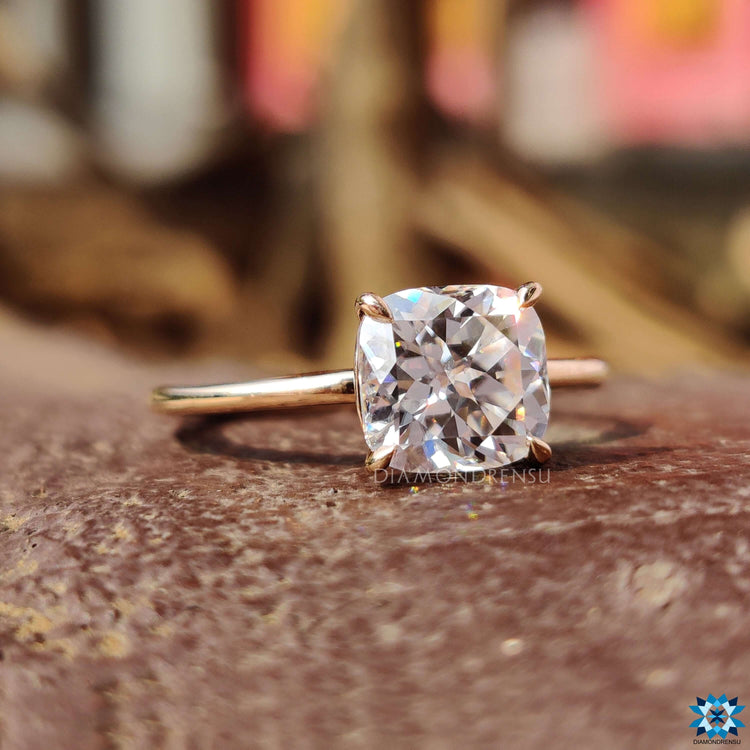 Solitaire engagement ring crafted in rose gold with precise prong setting.