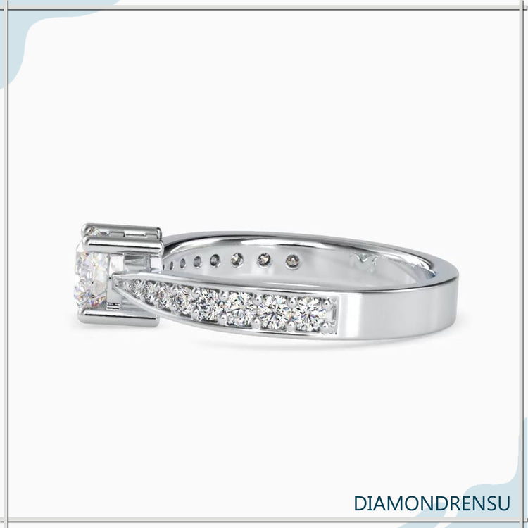 Yellow gold ring set with round diamonds on band.