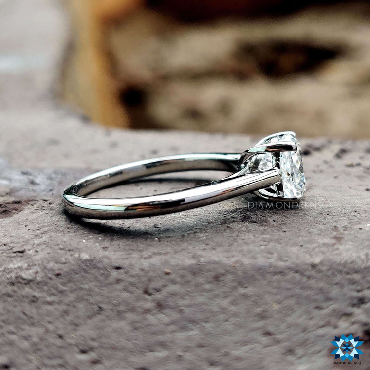 Handmade solitaire moissanite ring with prong setting.