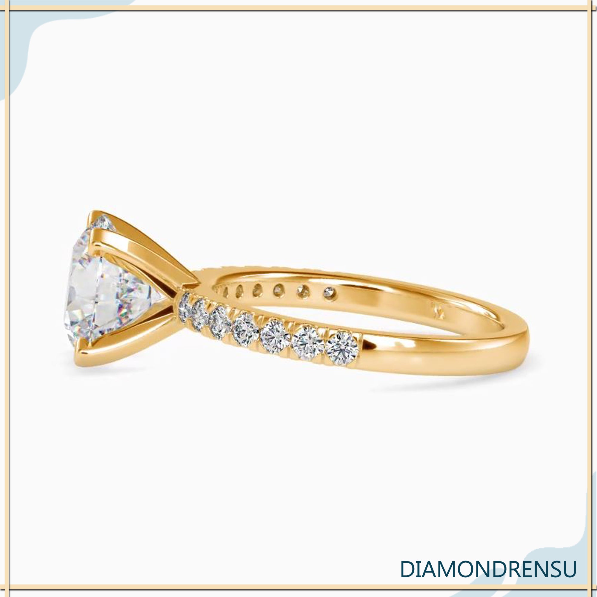 White gold round engagement ring UK.