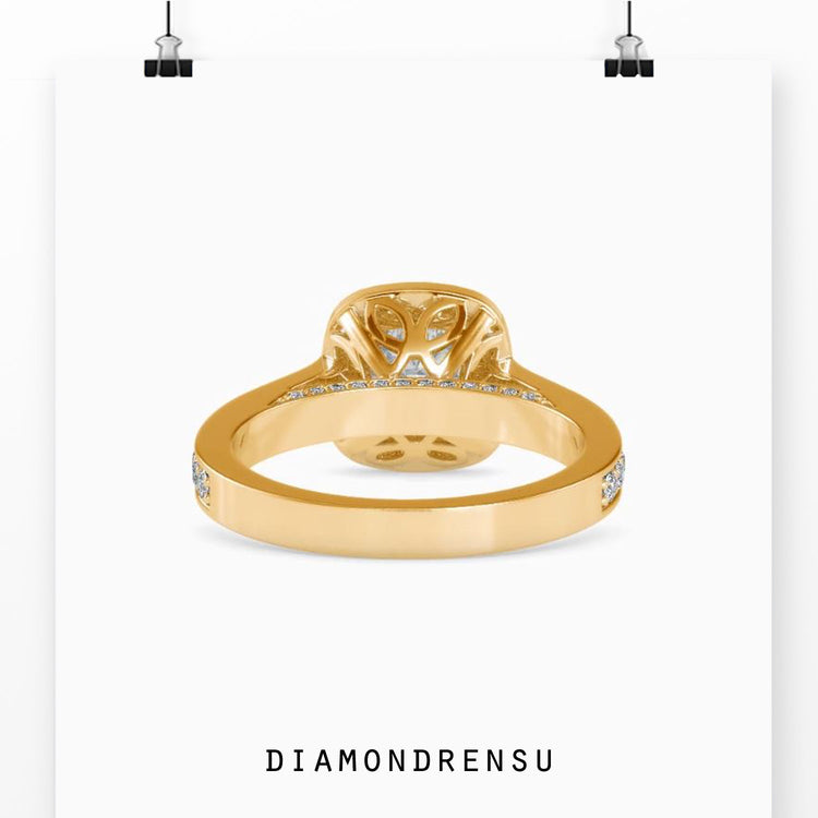 Cathedral setting ring in yellow gold with handmade band.