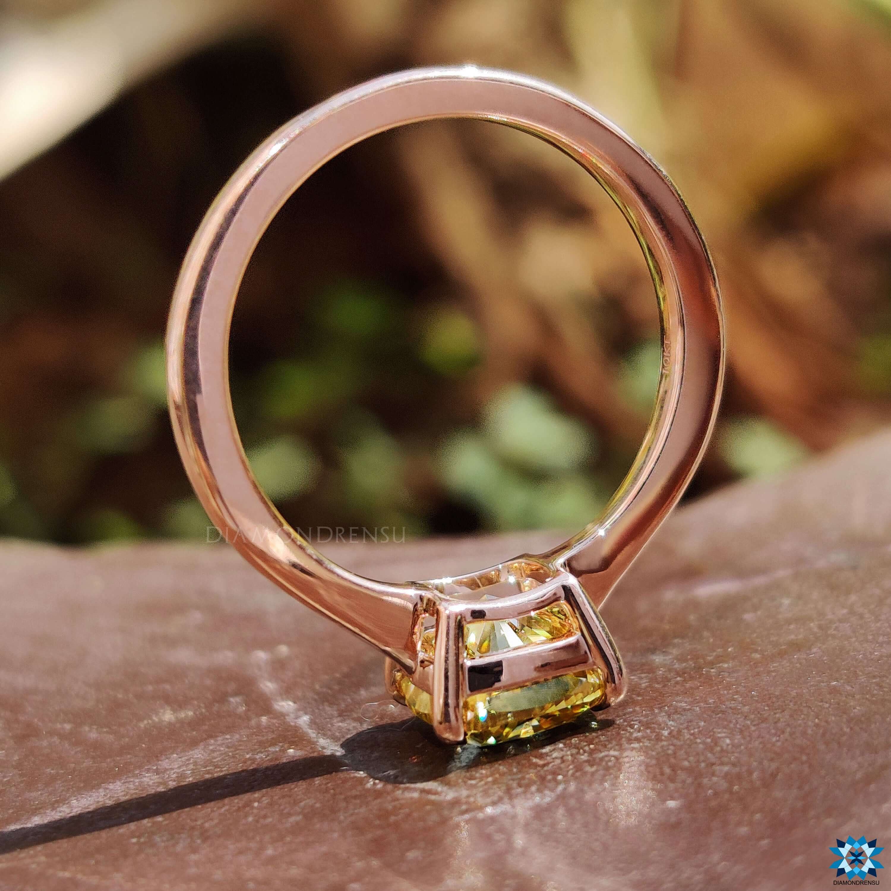 Custom engagement ring with yellow moissanite.