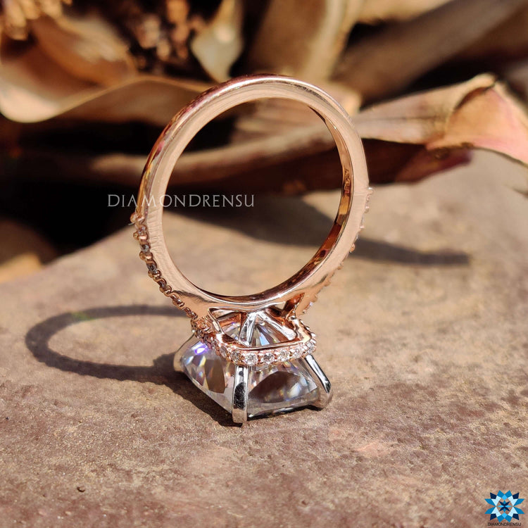 Handmade moissanite ring with pave and hidden halo.