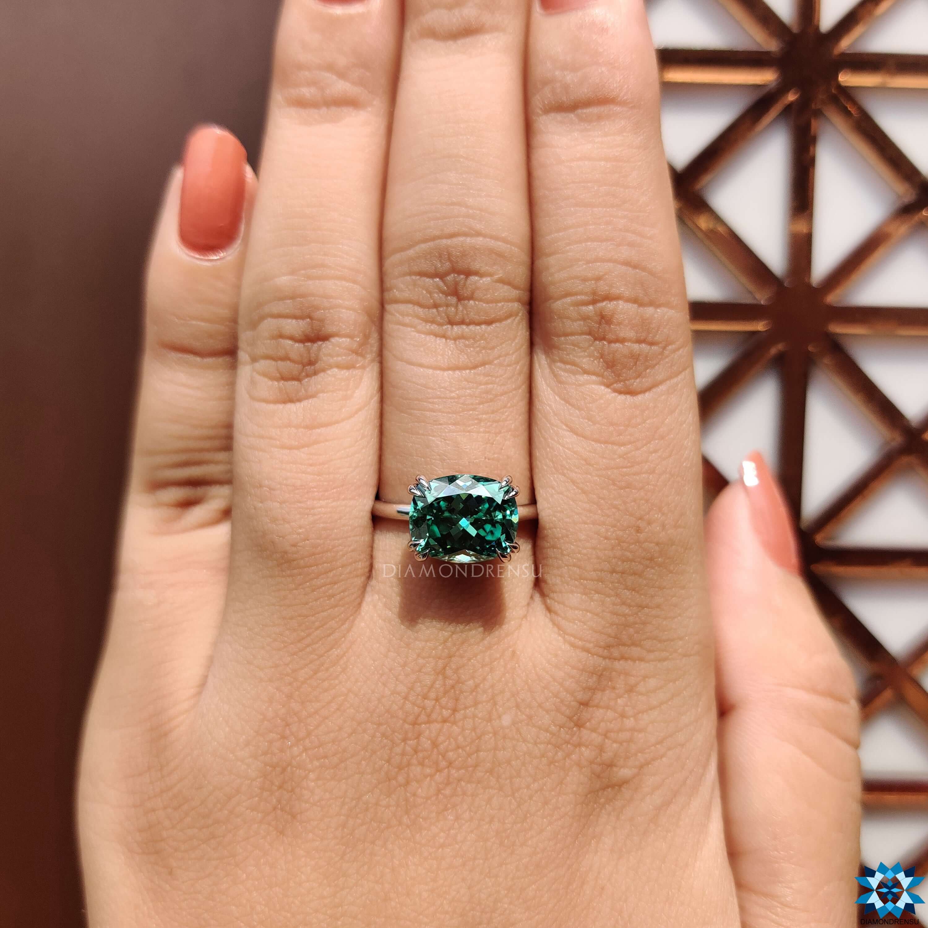 Solitaire moissanite ring with double prong setting.
