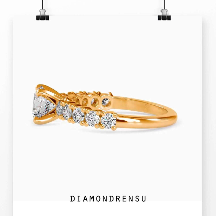 Custom design ring featuring round diamond and pave band.