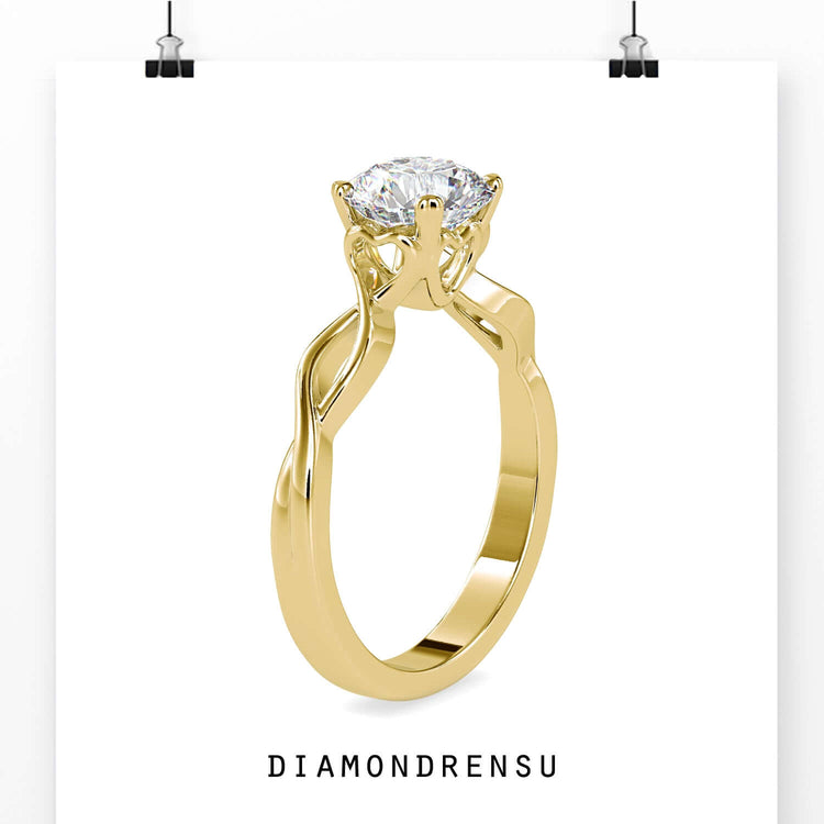 Round diamond rose gold twisted engagement ring.