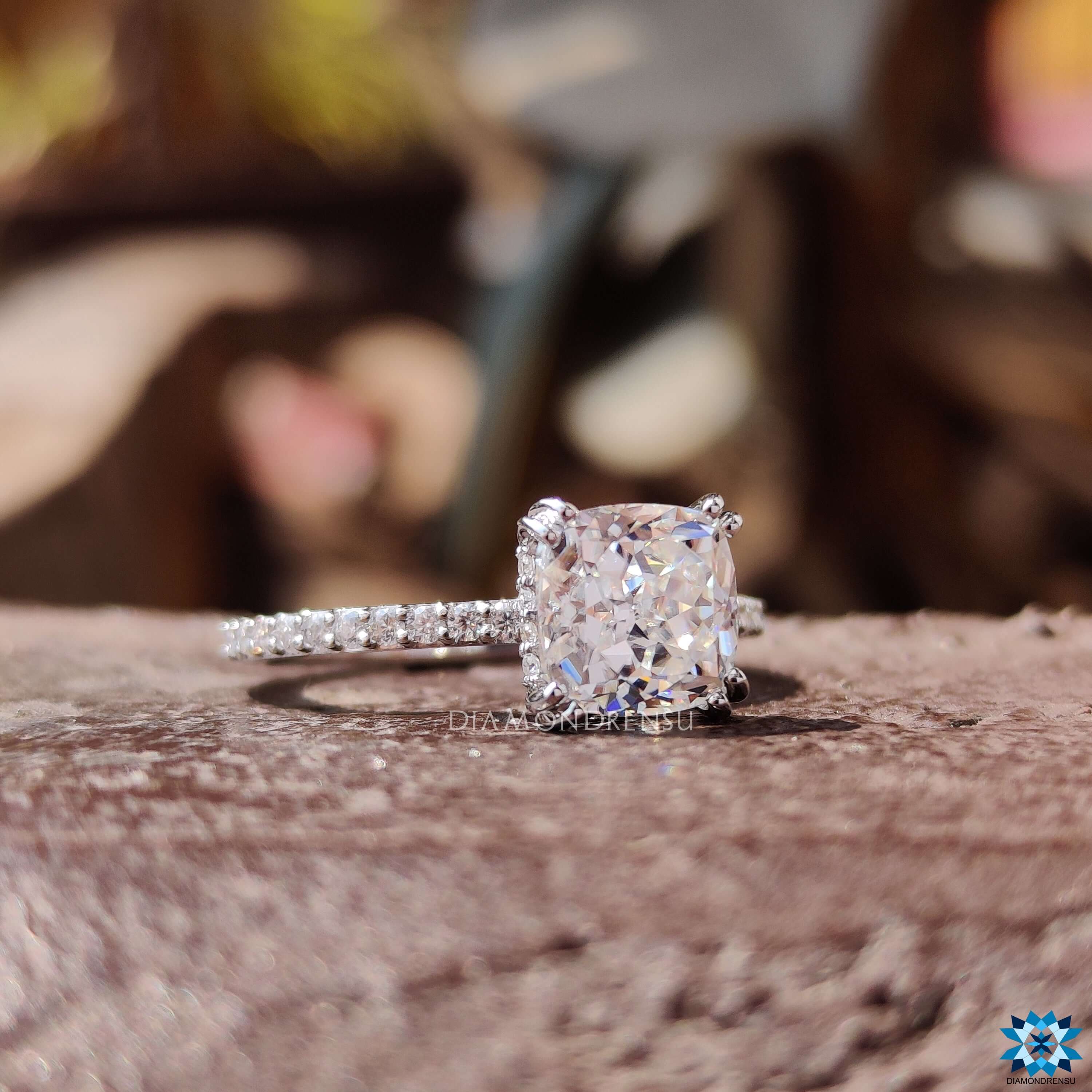 Round cut pave band with sapphire hidden accent stones.