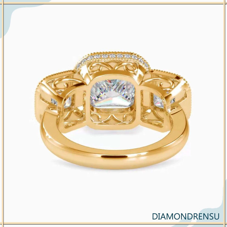 Lab diamond ring with three stone setting and hidden halo detail.