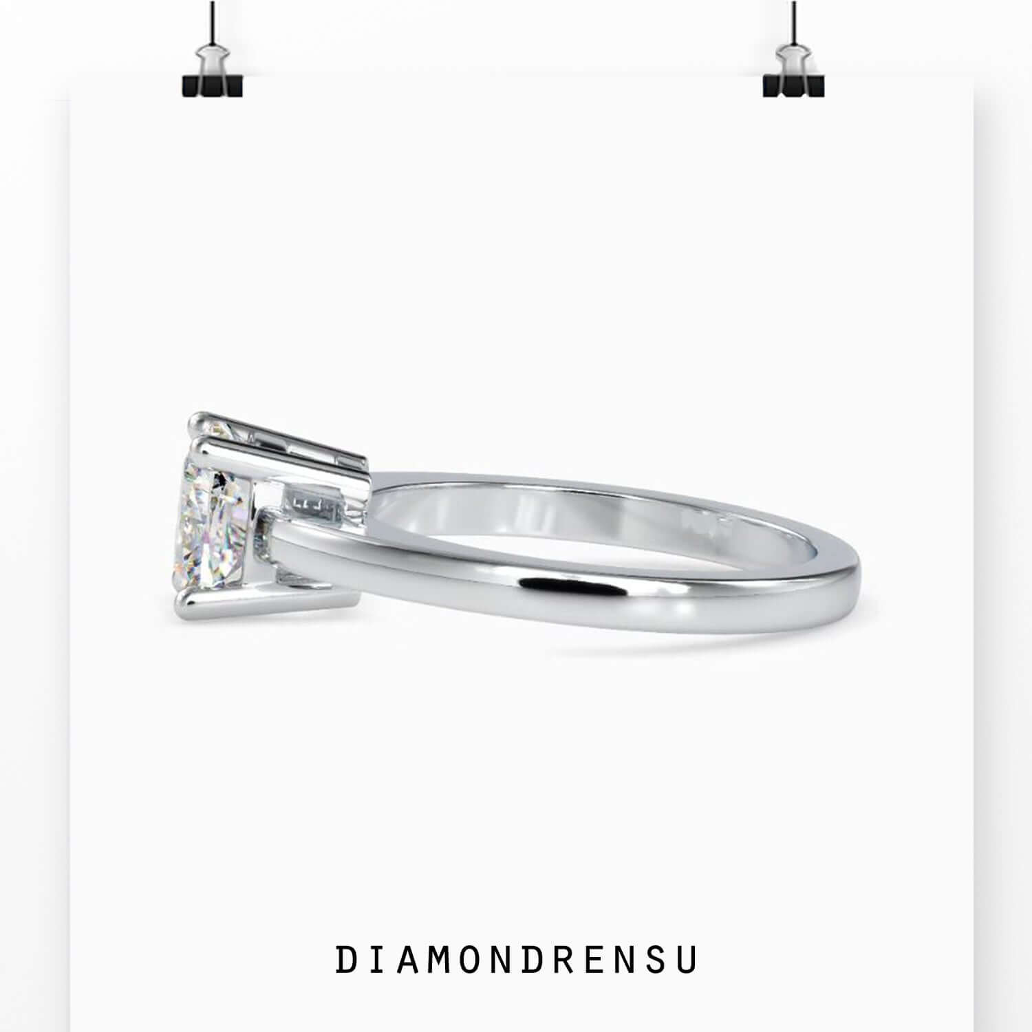Cushion diamond solitaire ring handmade in rose gold, perfect for a custom engagement ring.