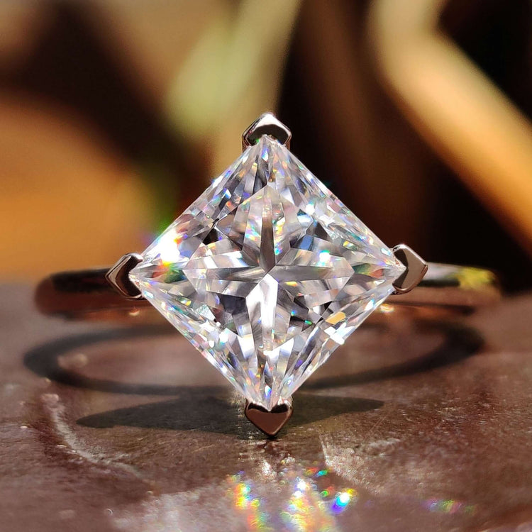 Princess cut moissanite engagement ring.