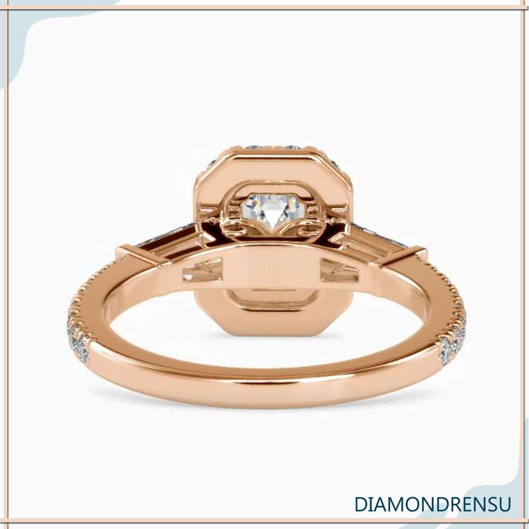 IGI certified emerald cut with round prong setting.
