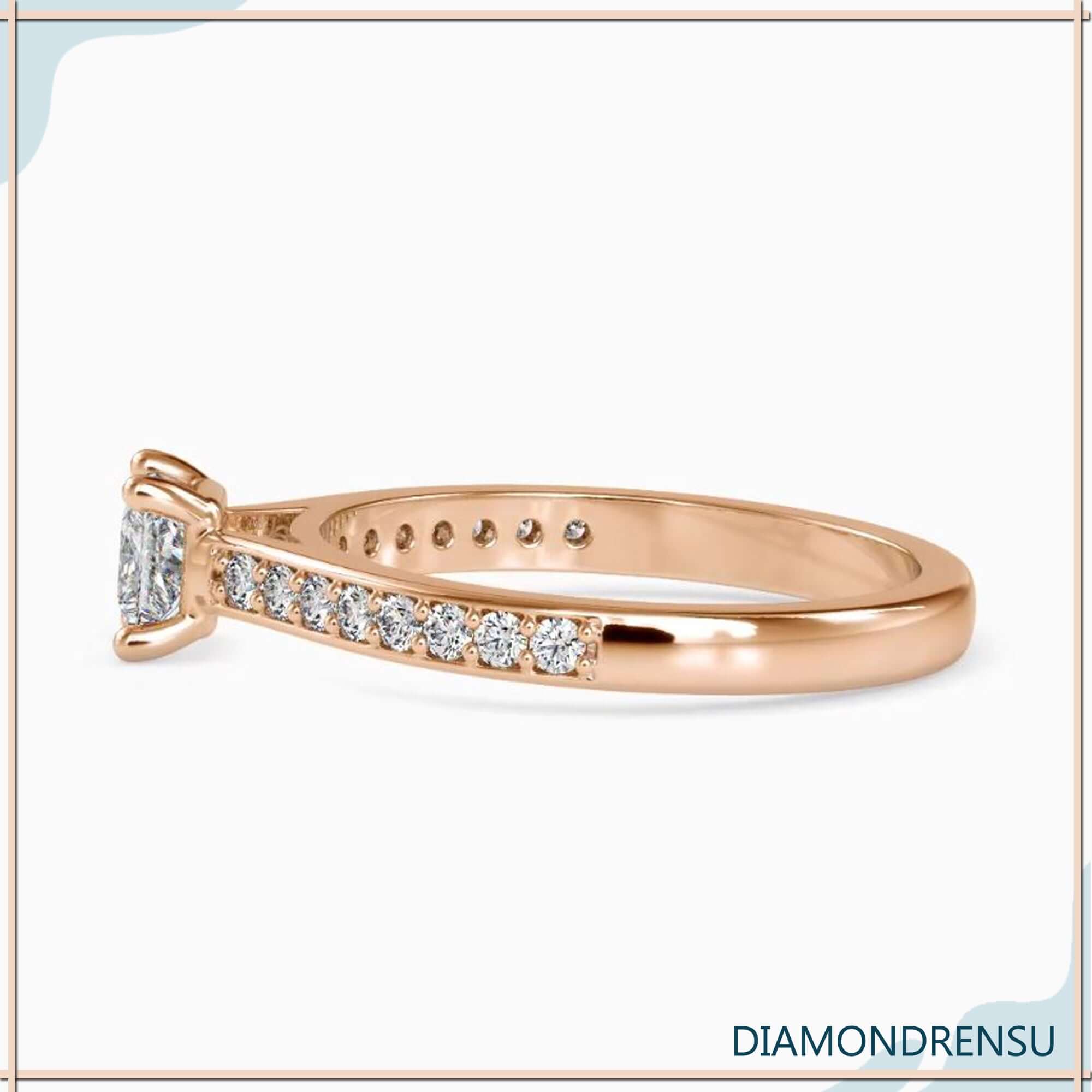 White gold ring with channel set round cut diamonds.
