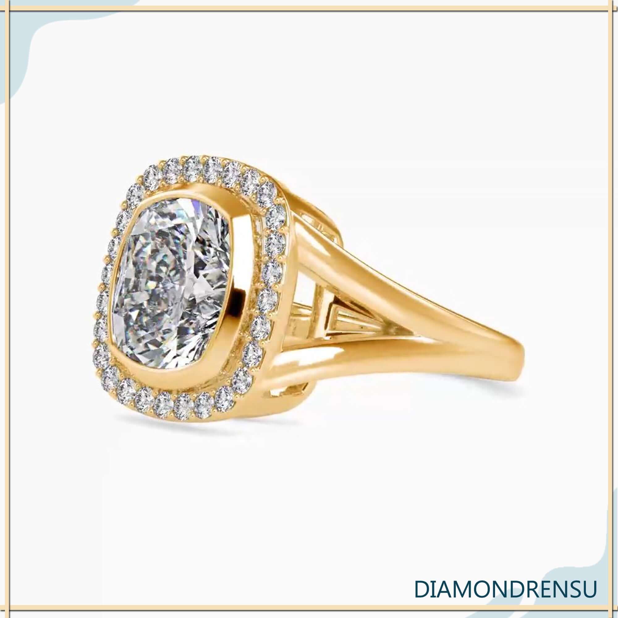 Yellow gold cushion halo ring with lab grown diamond.