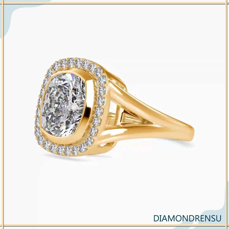 Yellow gold cushion halo ring with lab grown diamond.