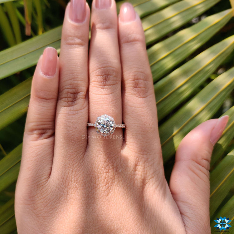 Buy rose gold moissanite engagement ring with halo.