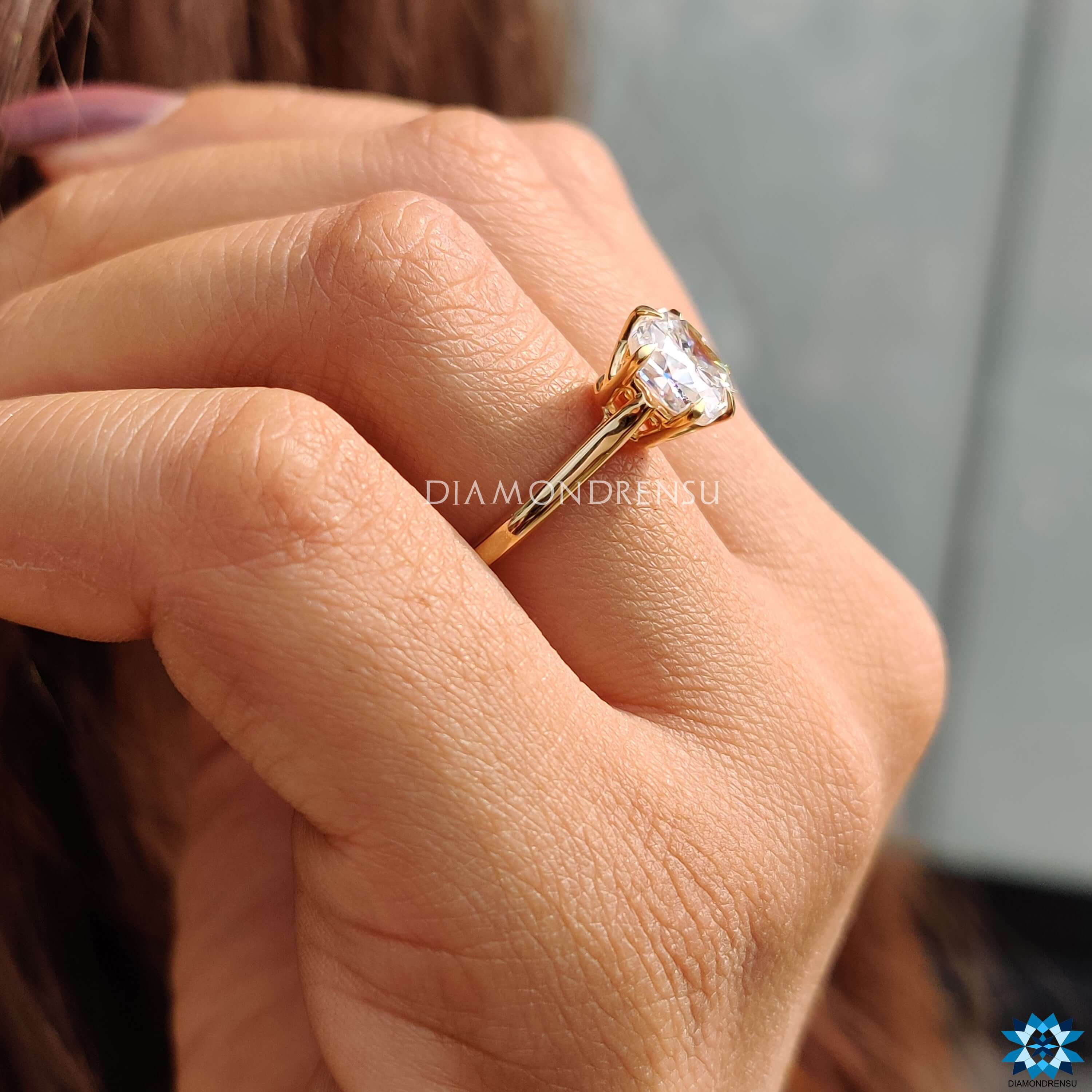 Handmade jewelry featuring cushion cut moissanite.