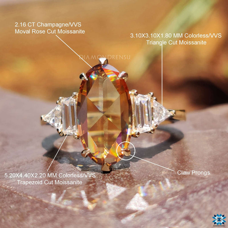 Handmade ring with rose cut moval moissanite.