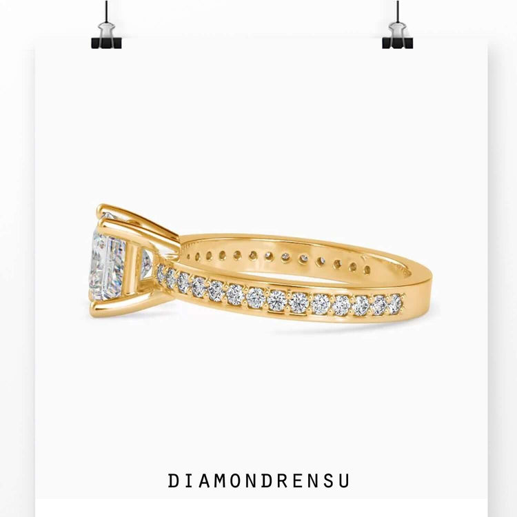 Rose gold ring with custom princess cut setting.