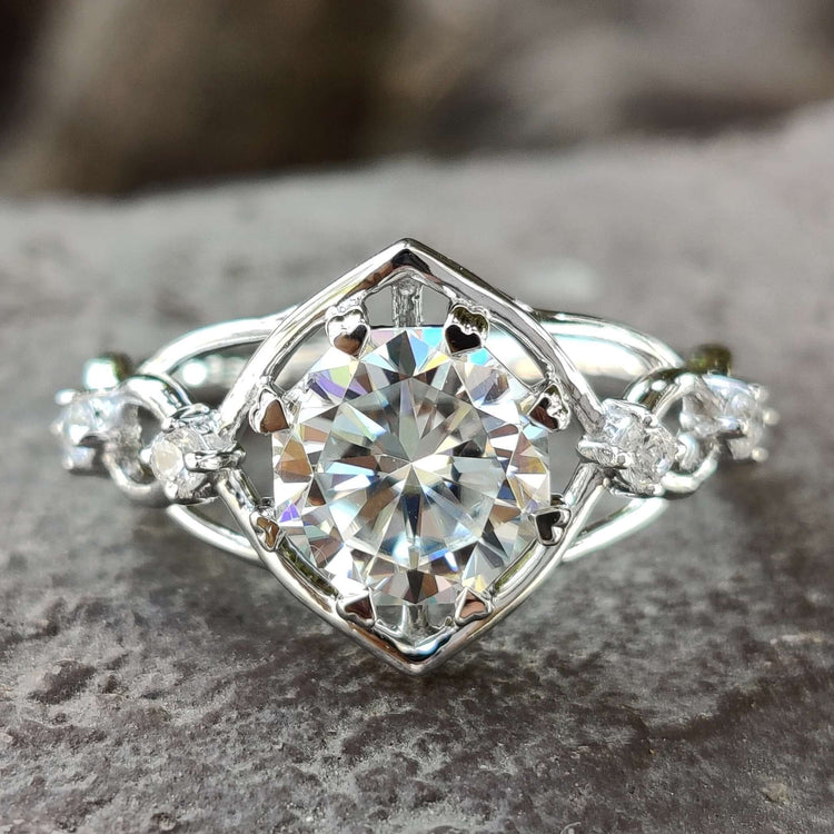 Octagon engagement ring with round moissanite center.