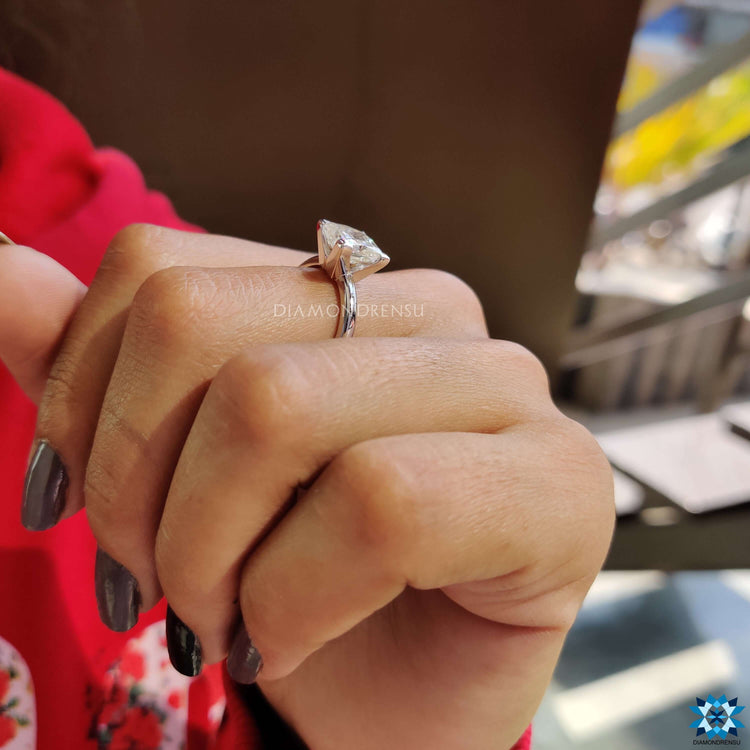 Princess solitaire ring crafted in white gold.