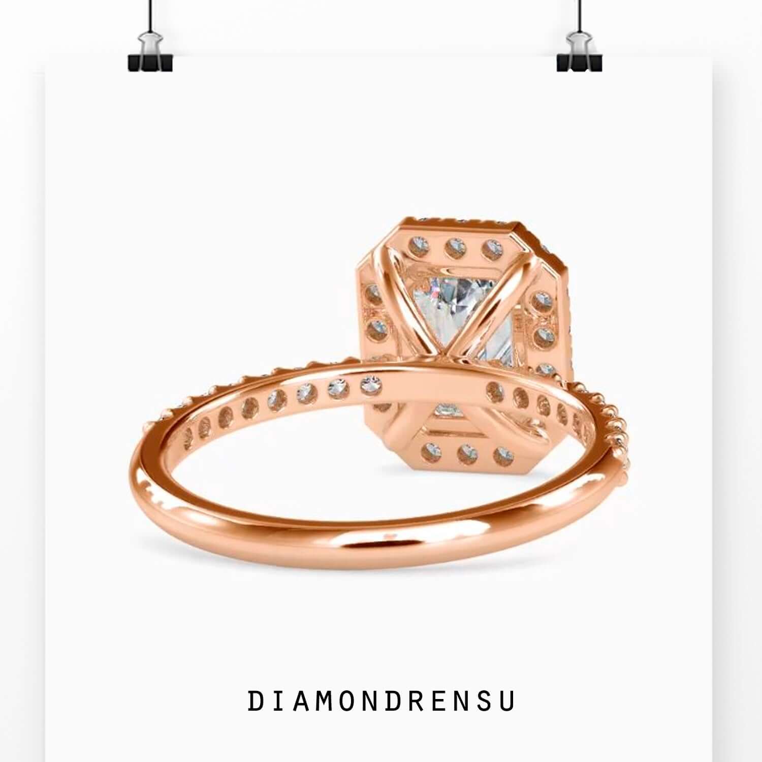 Yellow gold diamond ring with pave halo setting.