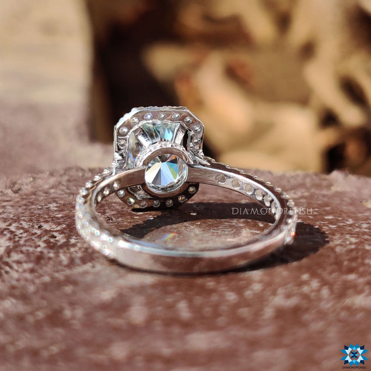 Custom radiant moissanite ring with halo and hidden halo design.