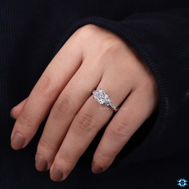4 prong setting ring with princess cut moissanite.