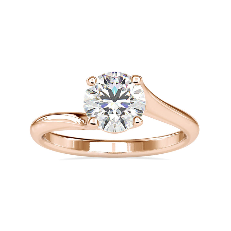 Custom design ring in rose gold with round diamond.