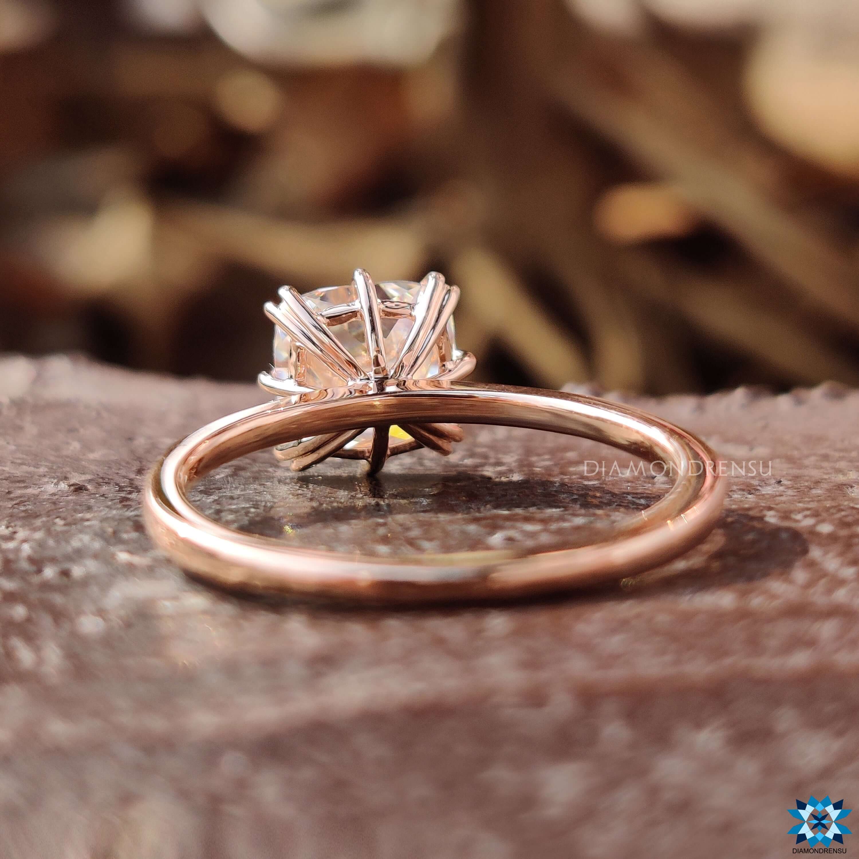 Custom engagement ring featuring cushion cut moissanite.