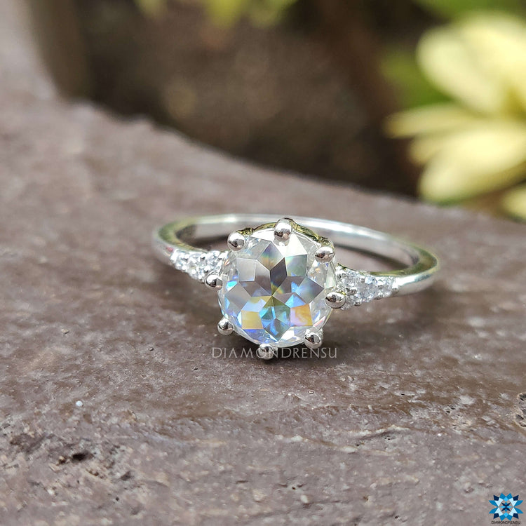 Handmade jewellery with prong setting and round rose cut Moissanite.