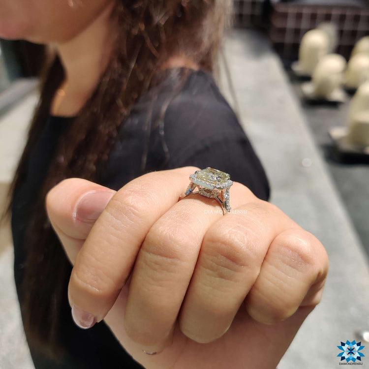 Handmade radiant engagement ring with prong setting.