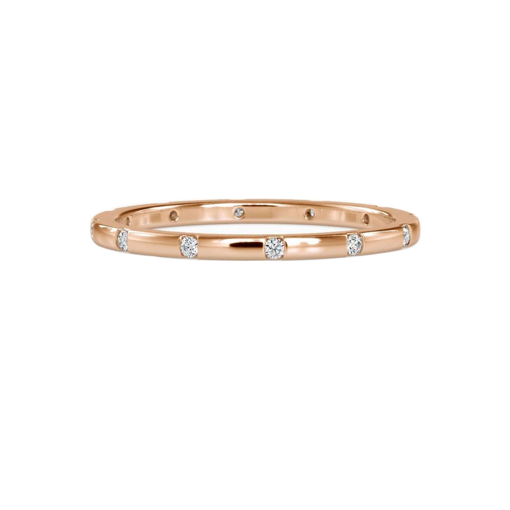 Lab grown diamond eternity ring in a custom setting.