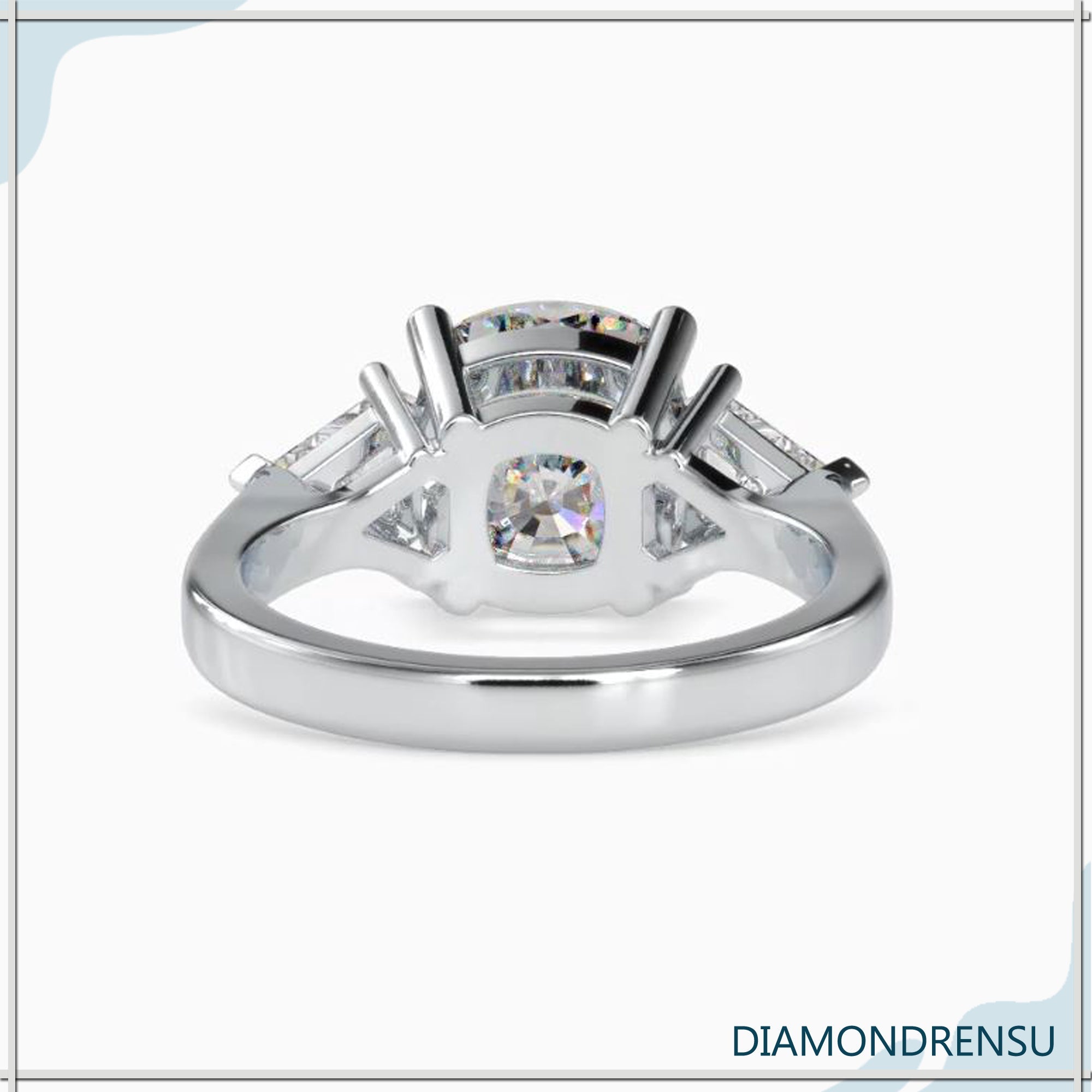 UK engagement ring with custom design and cushion cut centre.