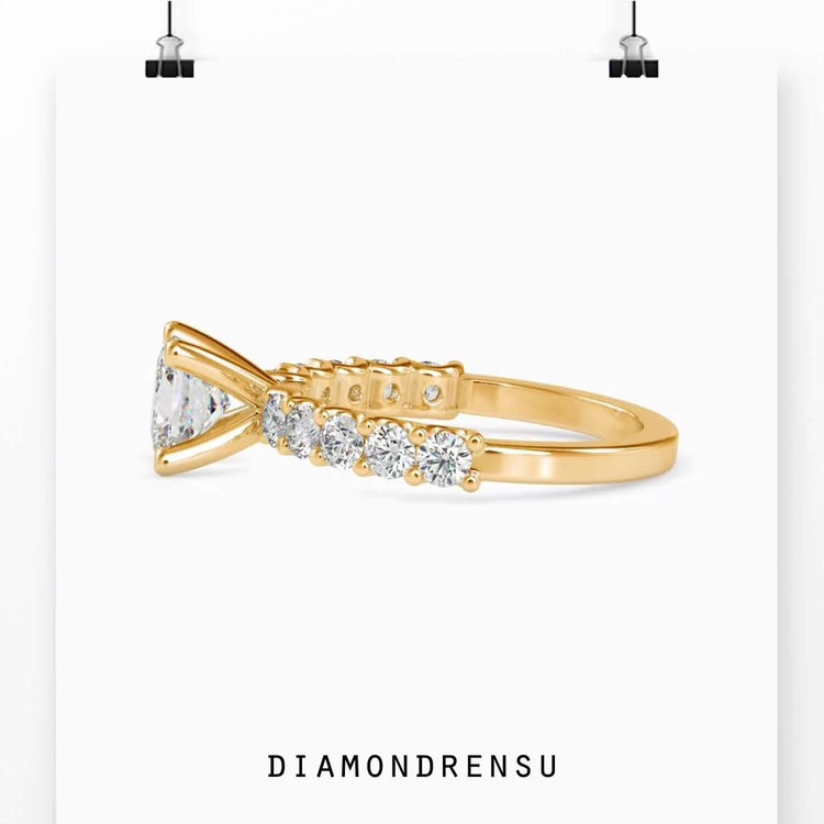 Lab grown diamond engagement ring with princess cut and gold finish.