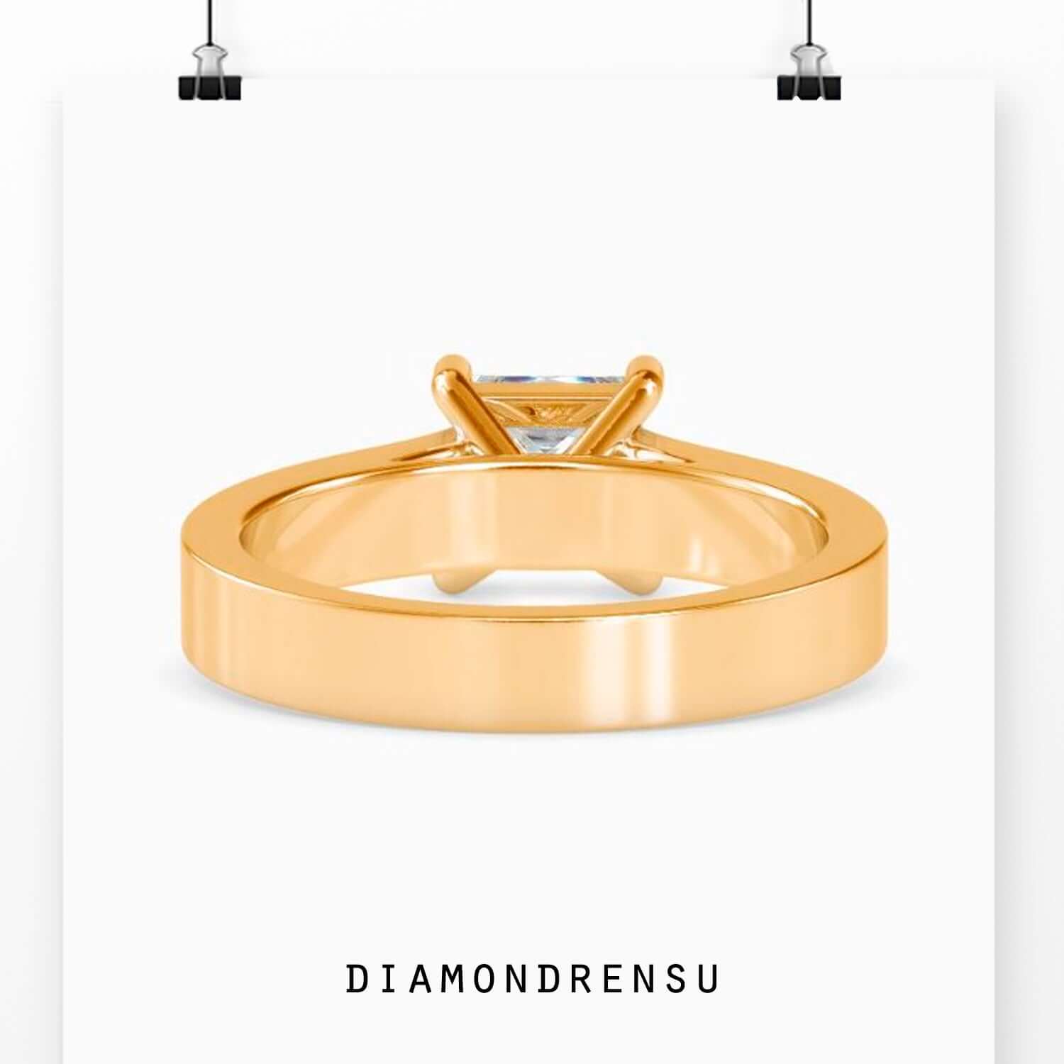 Handmade ring featuring princess cut in cathedral setting.