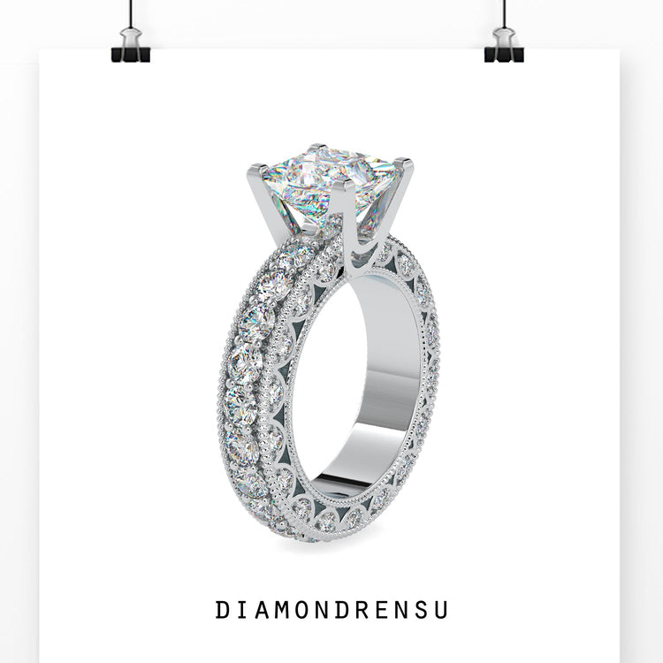 Designer ring with handmade side stone and pave accents.