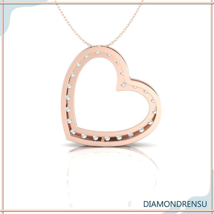 Unique handmade jewellery pendant with gold heart charm.