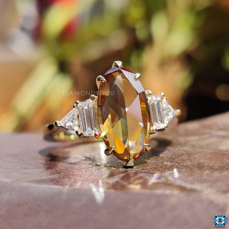 Yellow gold moissanite ring with rose cut center.