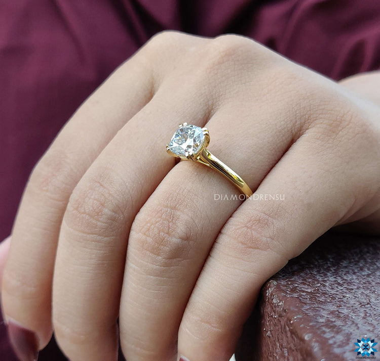 Moissanite diamond engagement rings with cushion cut center stone in a Double Prong Setting.