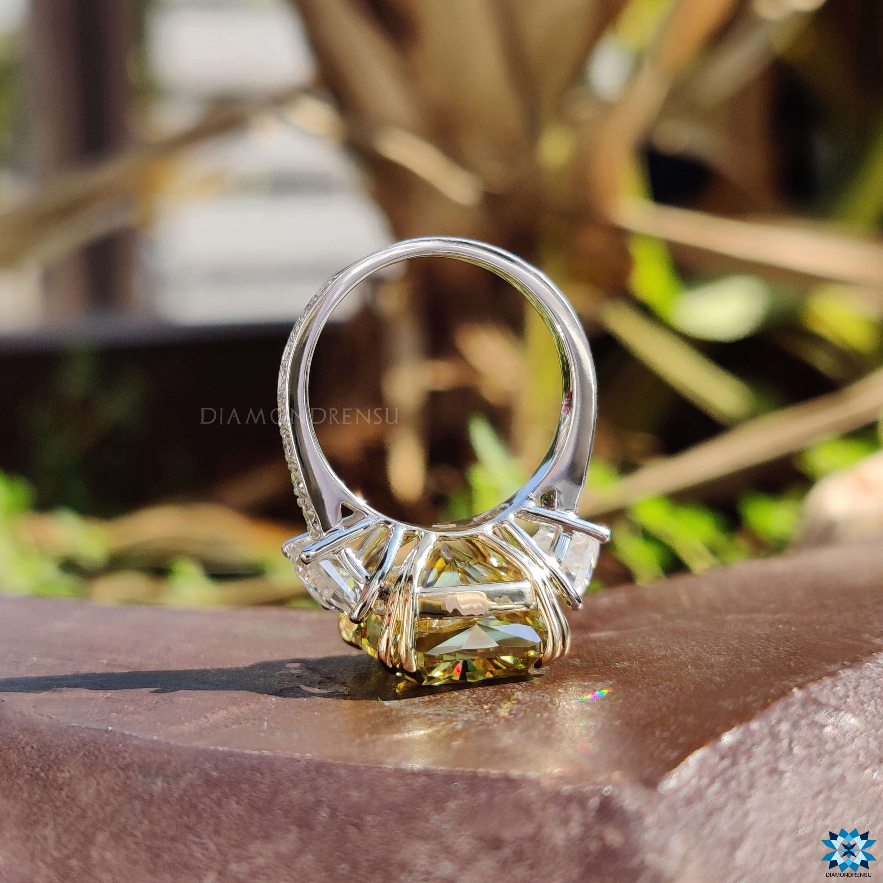 Double claw prong ring with radiant cut moissanite.