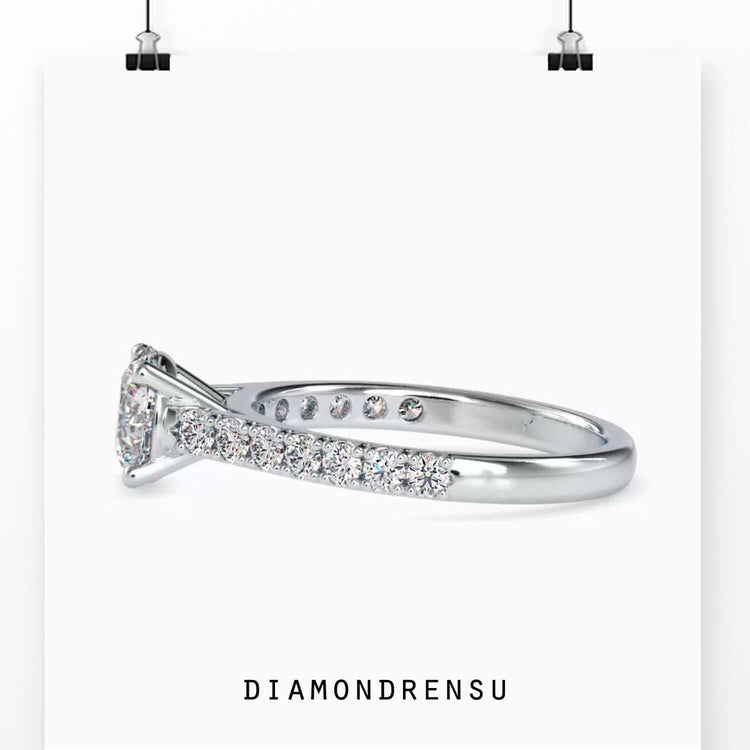 IGI certified engagement ring with round pave band in white gold.