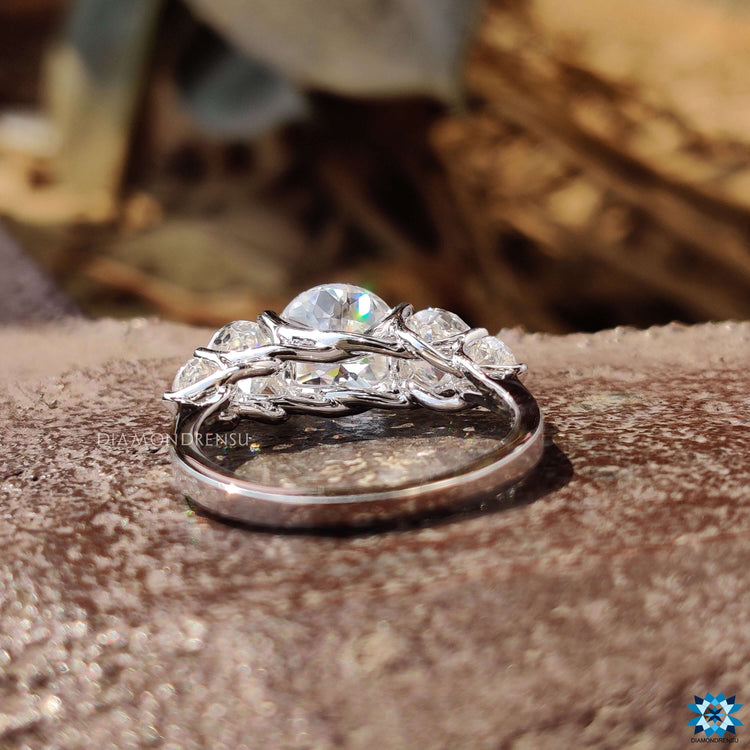 Handmade moissanite ring with jubilee center and side stones.