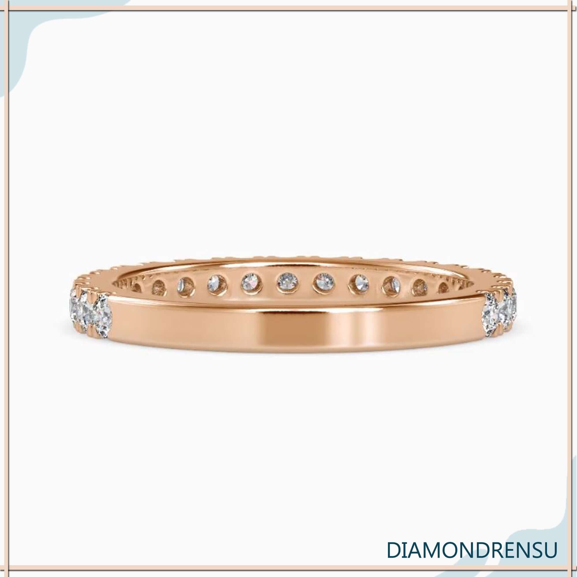 White gold wedding band with half eternity lab diamonds.