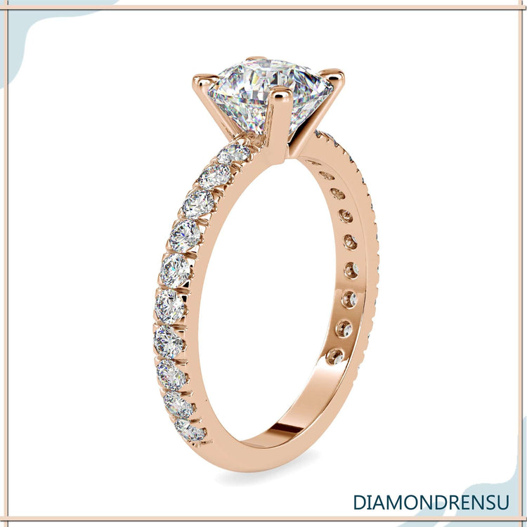 Rose gold engagement ring with handmade pave design.